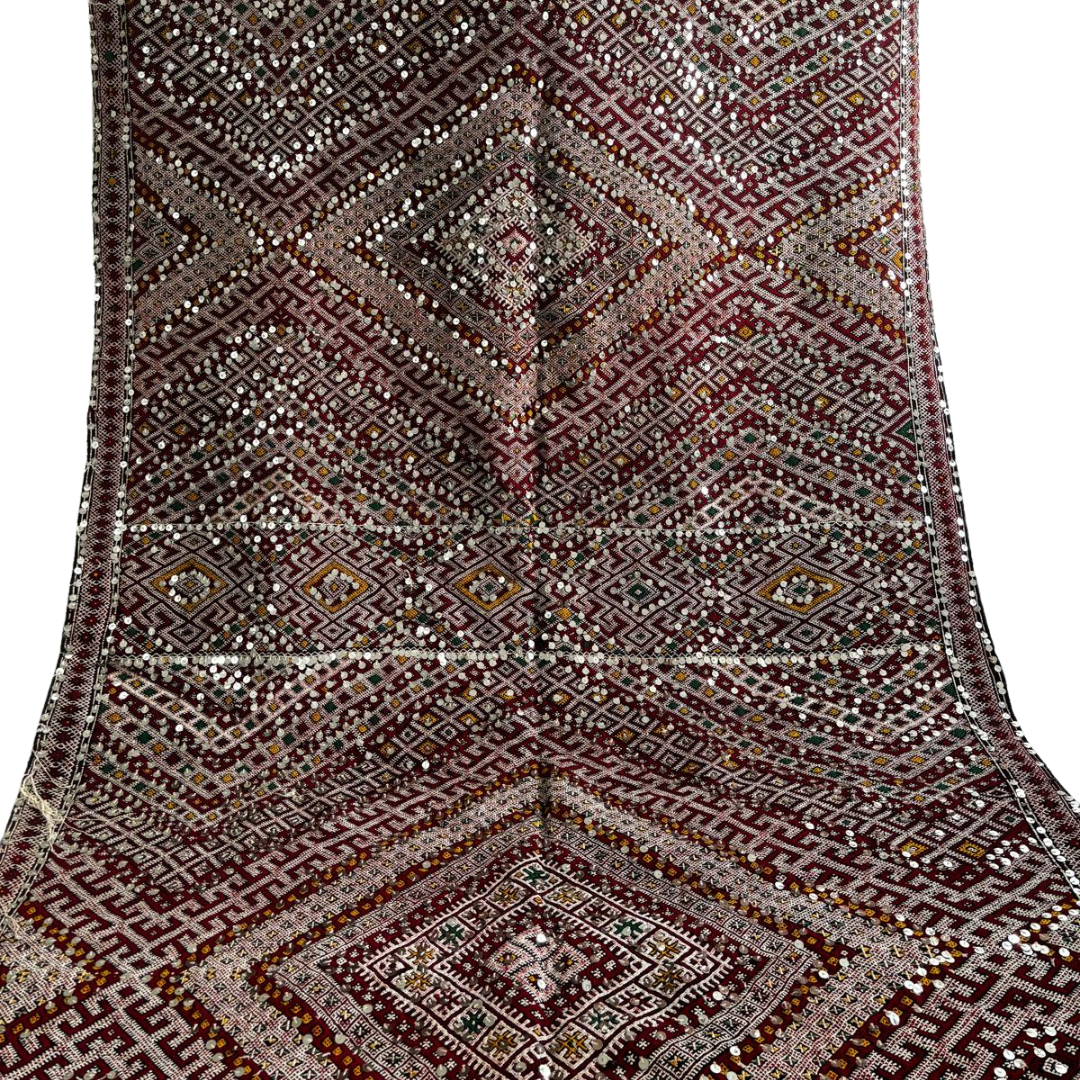 Tapis coloré et perlé