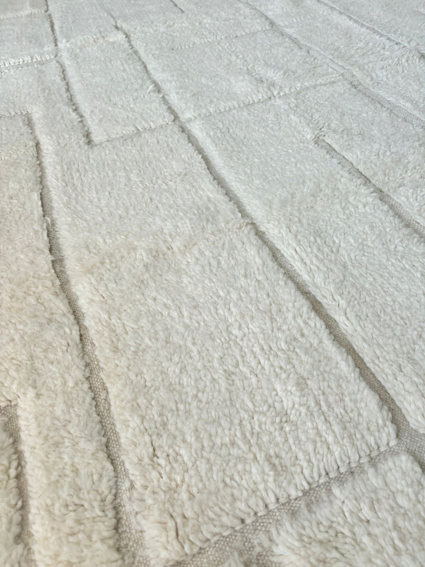 Tapis crème abstrait